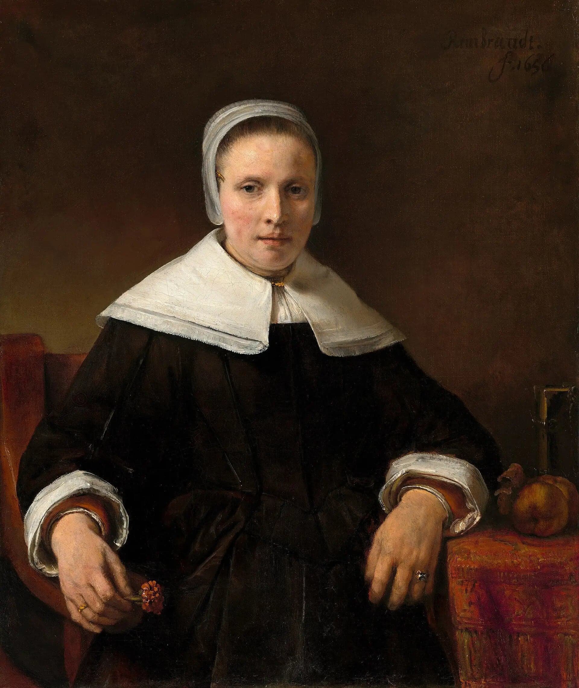 A Woman Holding a Rose