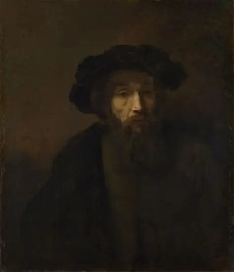 A bearded man with a cap