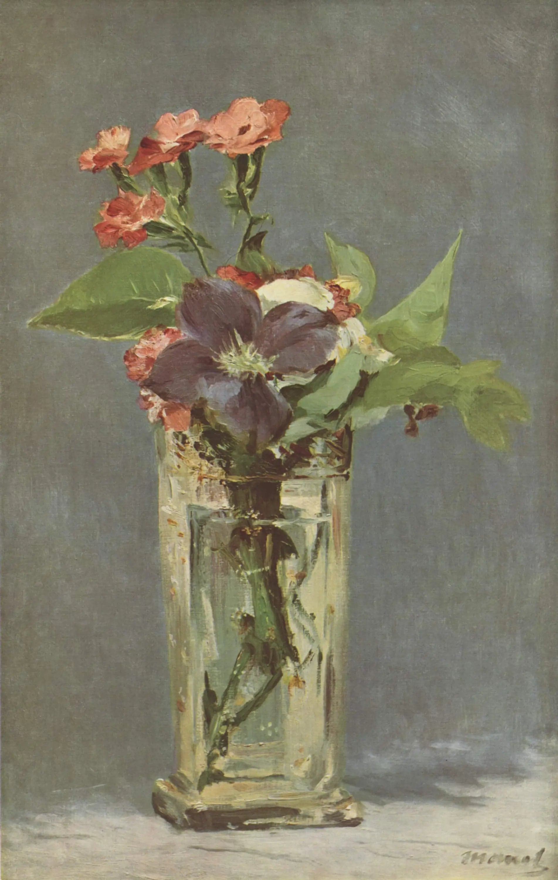 Carnations and clematis in a crystal vase