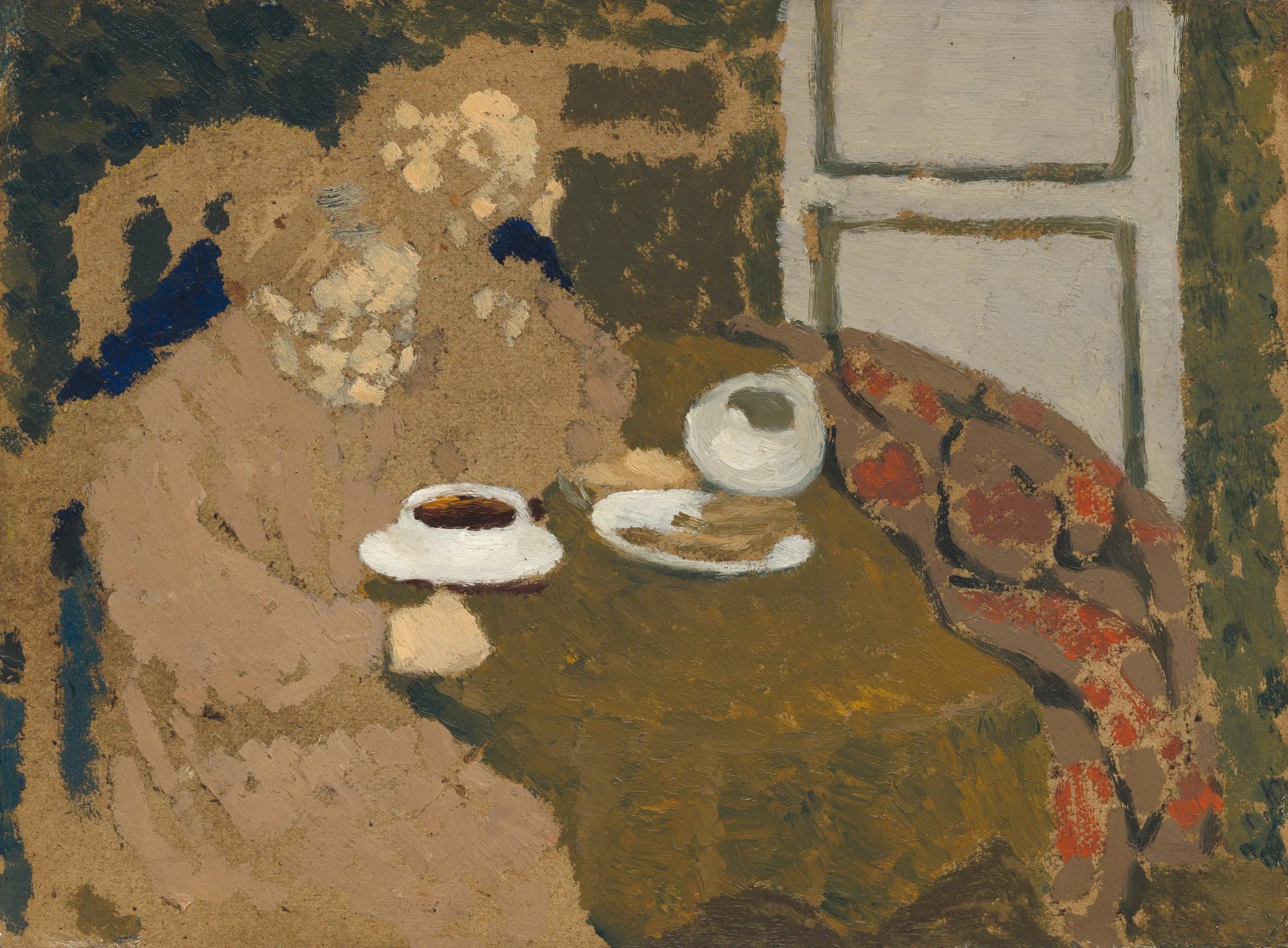 Two women drinking coffee