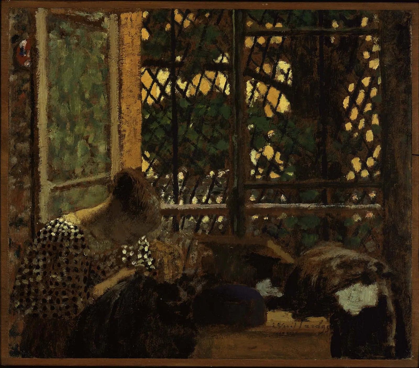 Woman sewing in front of a garden window