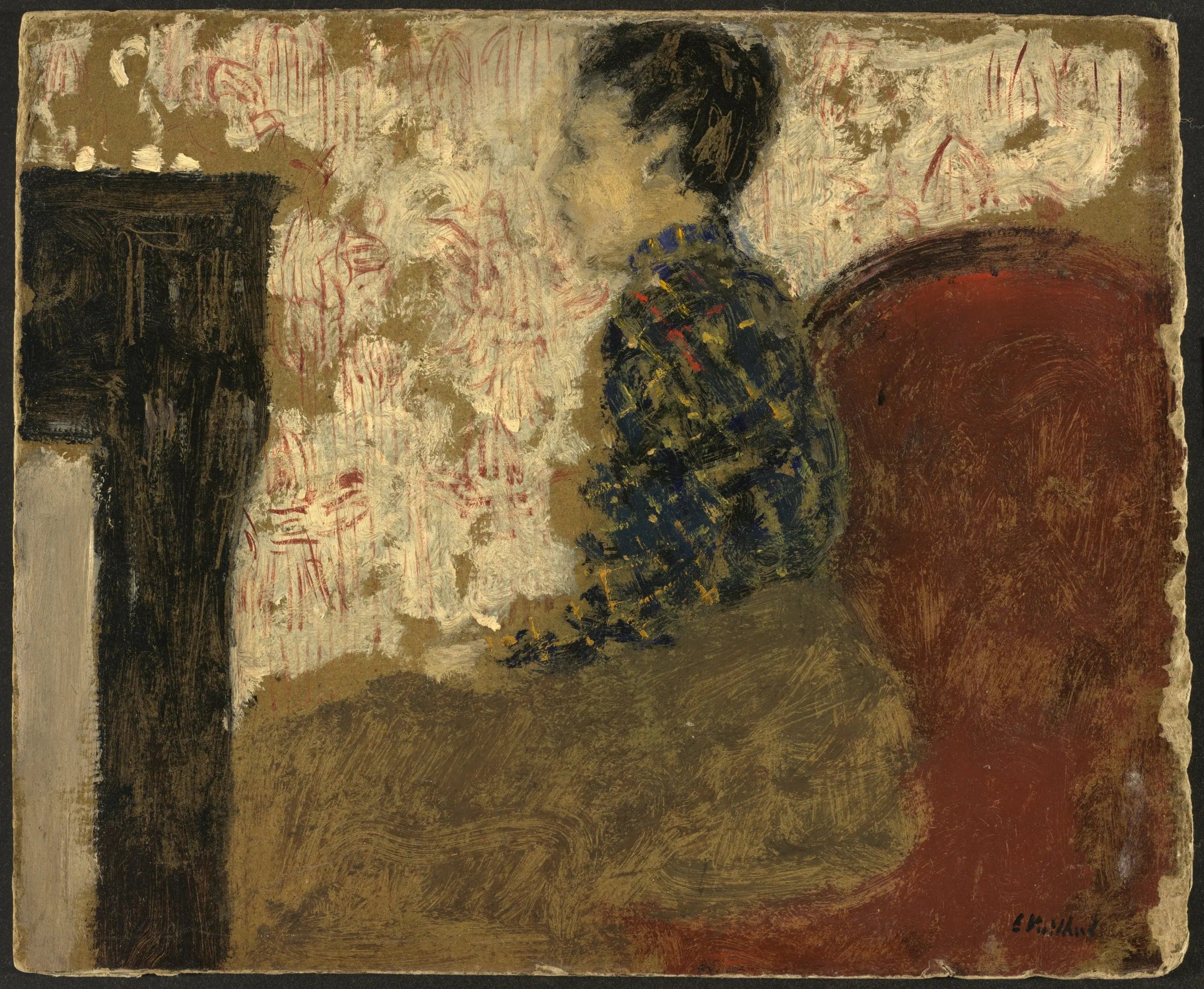 Woman sitting by the fireplace