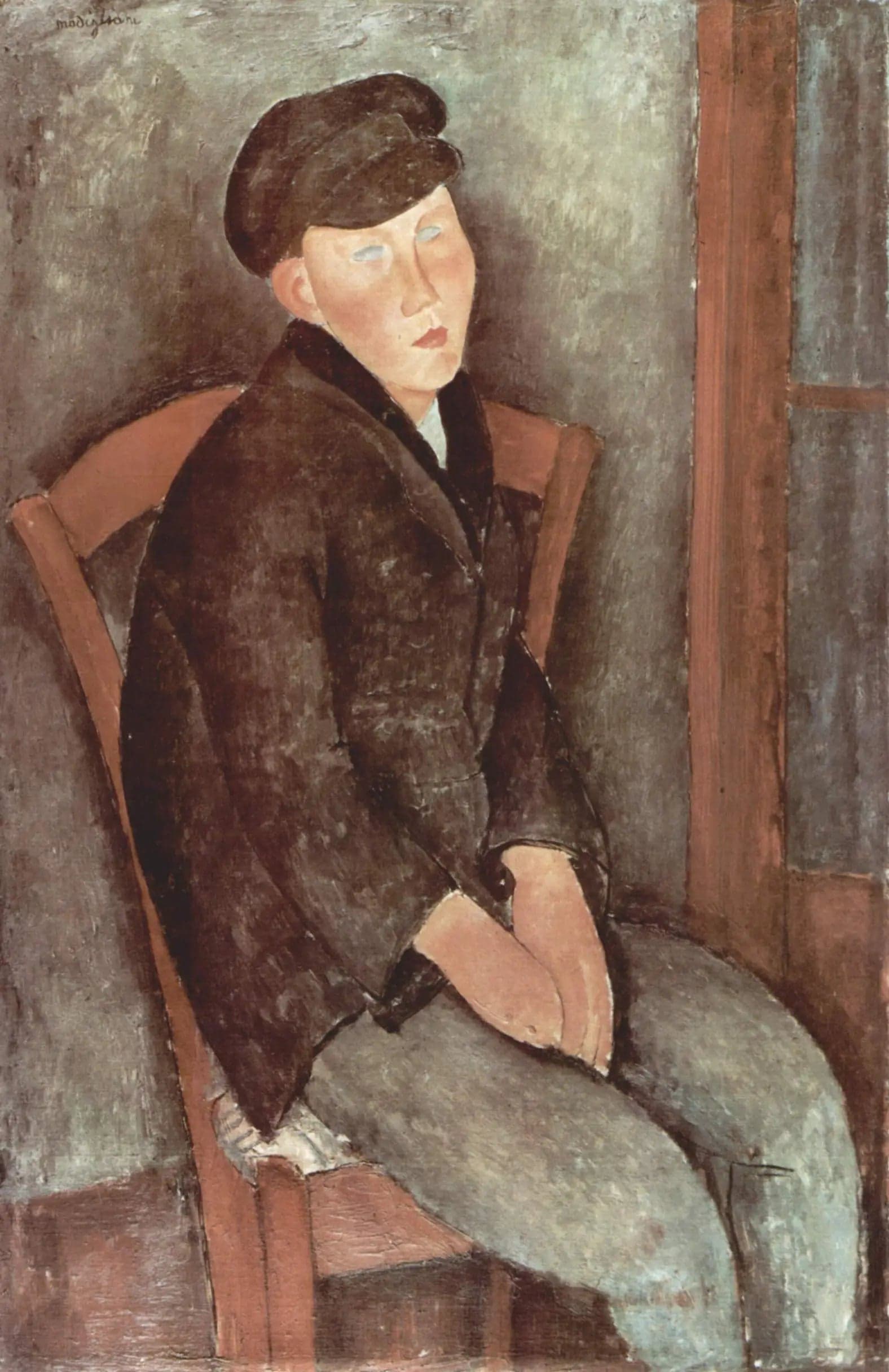 Boy Sitting with a Cap