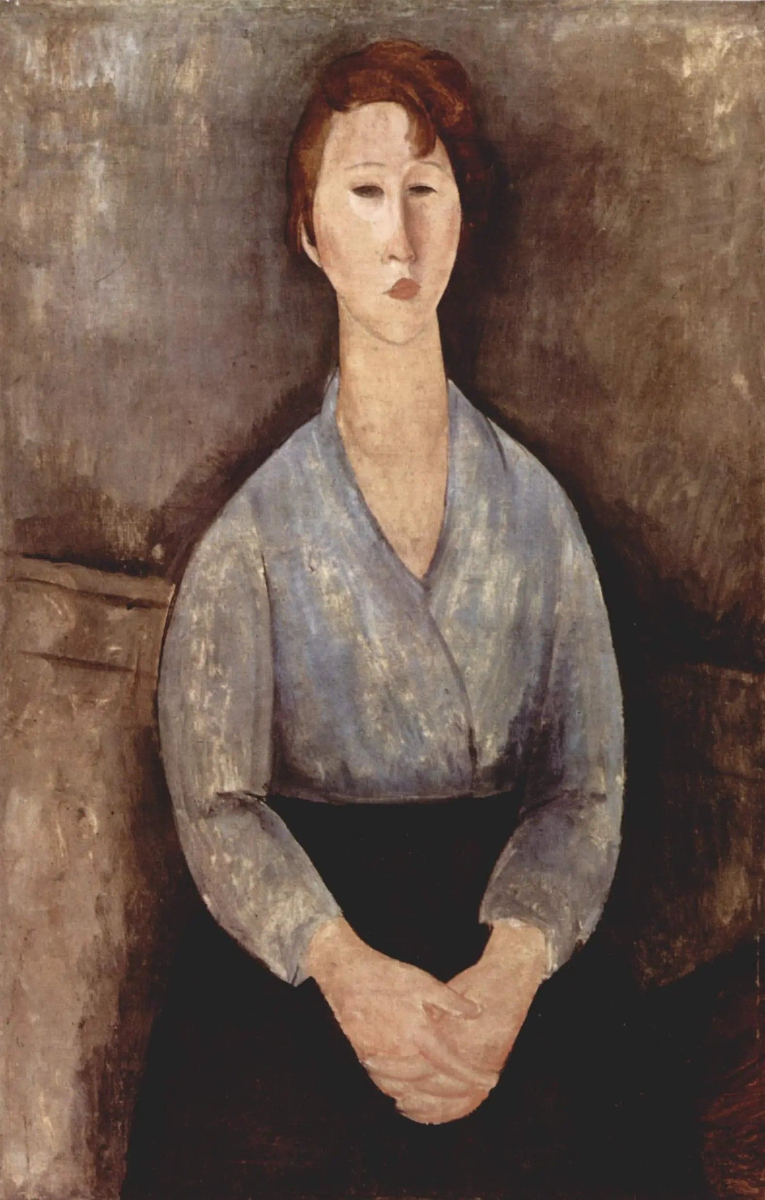 Woman Sitting with a Blue Blouse