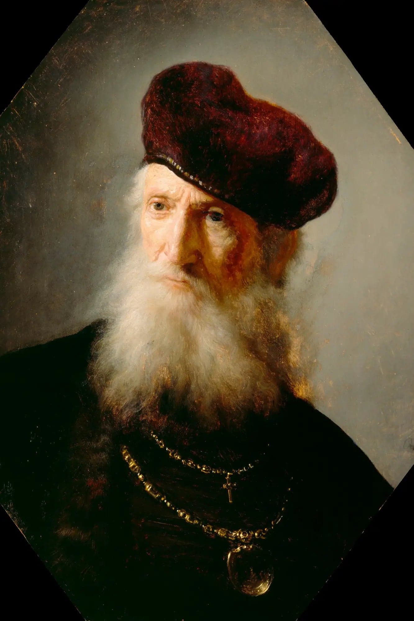 Head of an old bearded man wearing a high beret