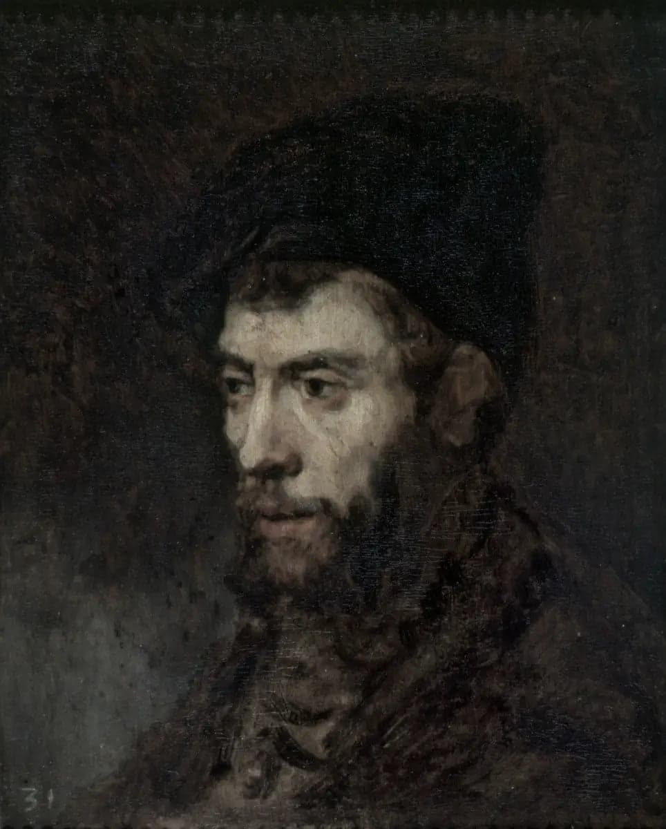 Man wearing a beret looking to the left