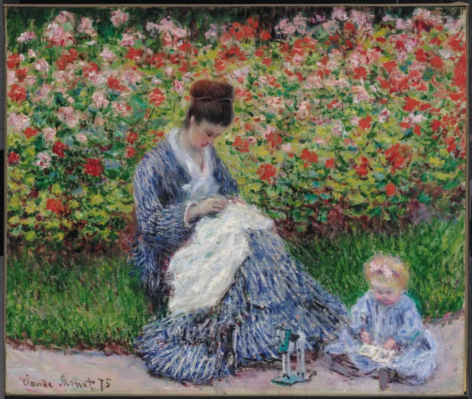 Camille Monet and a child in the artist's garden at Argenteuil