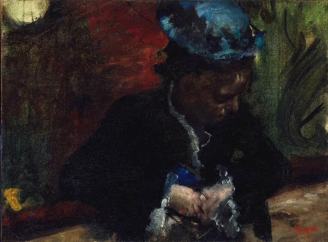 At the theater: woman sitting in the balcony