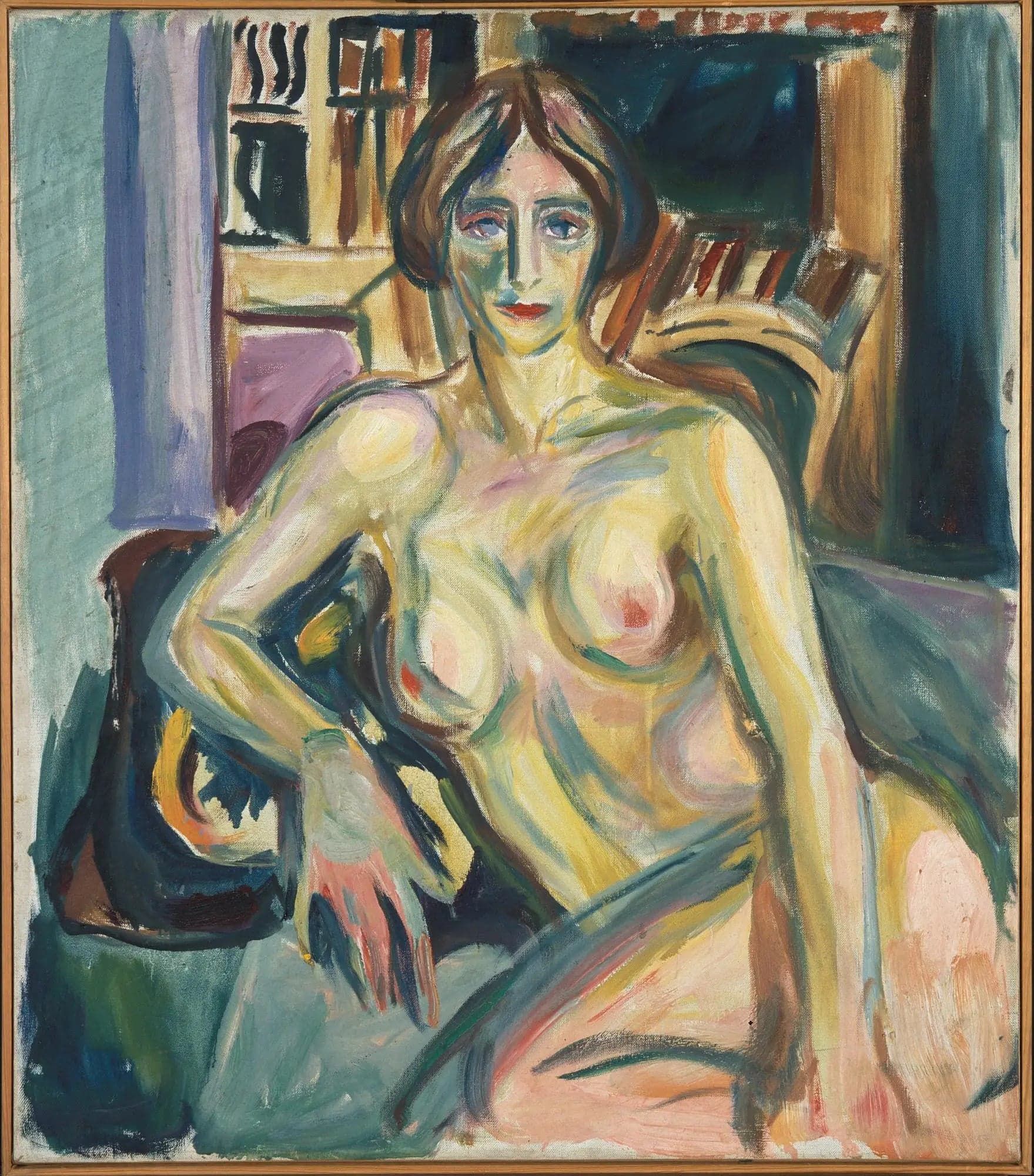 Nude, sitting on the sofa