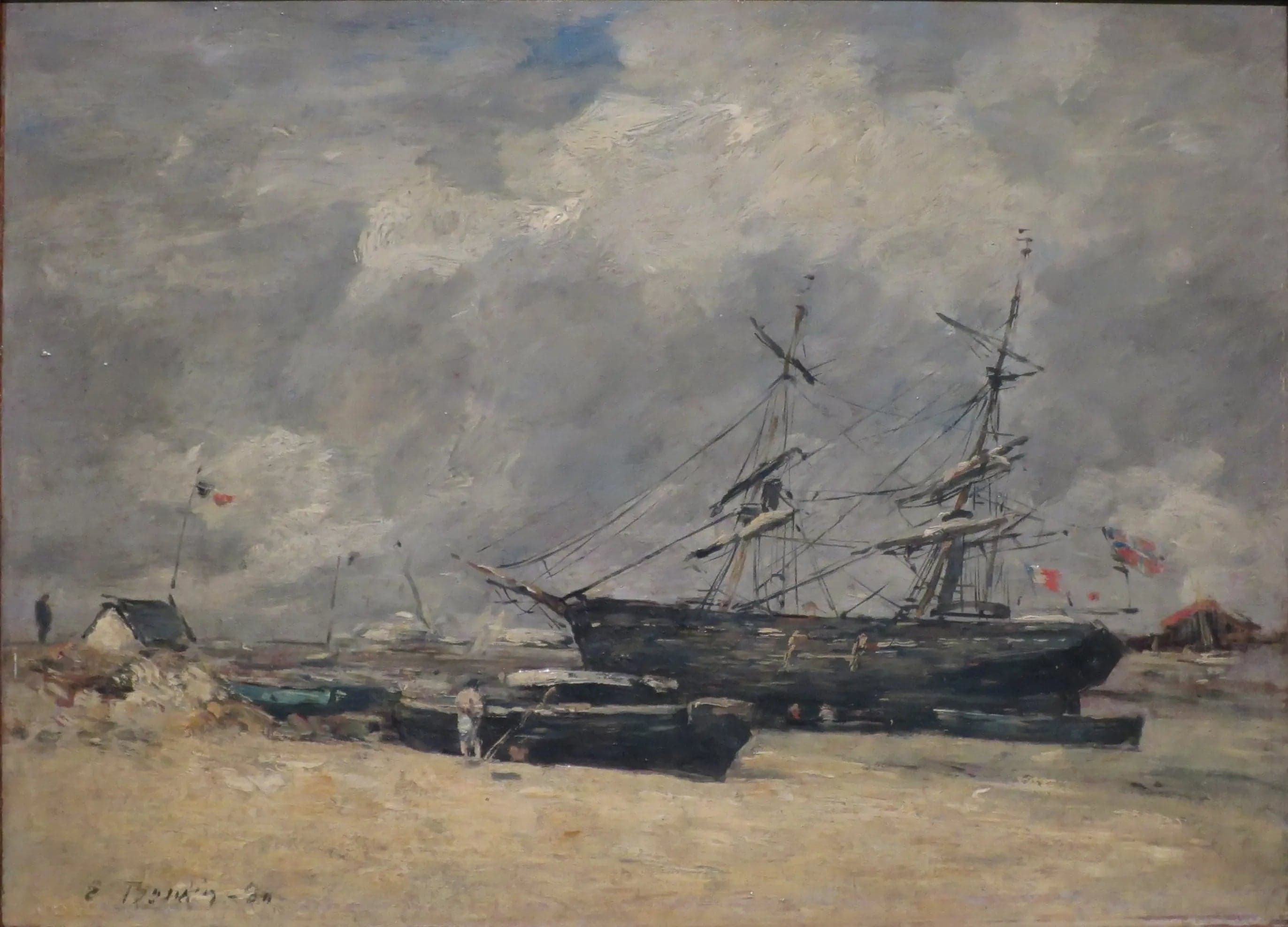 Fishing boats on the beach. Trouville, low tide
