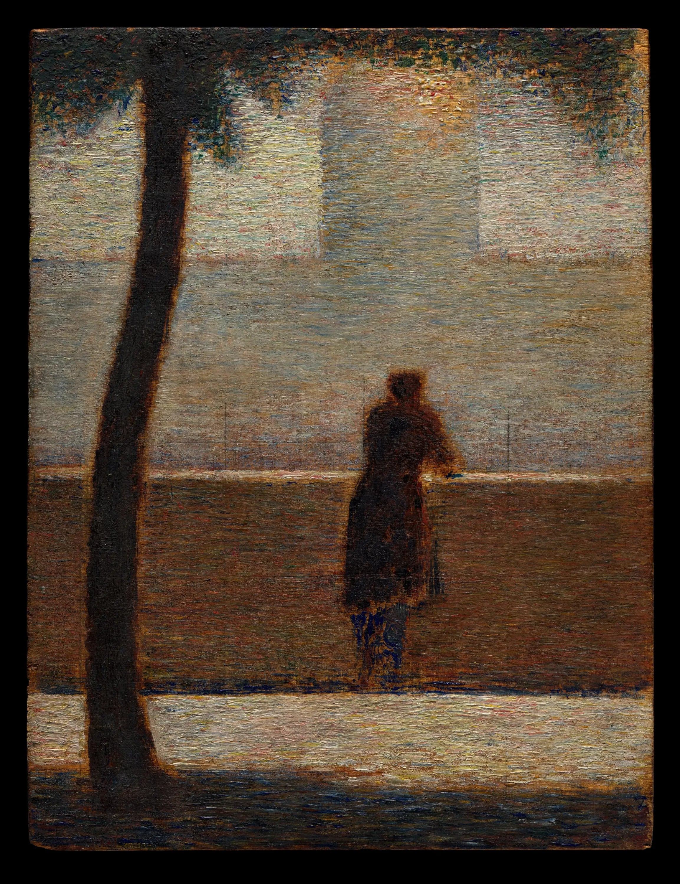 A man leaning on a parapet