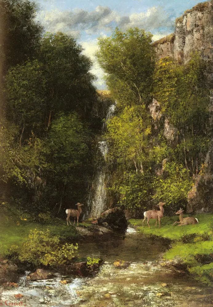A family of deer in a landscape with a waterfall