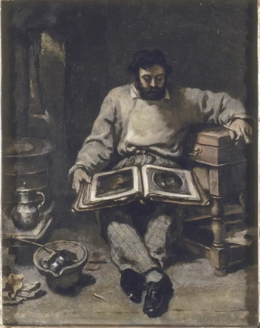 Marc Trapadoux examining a print book