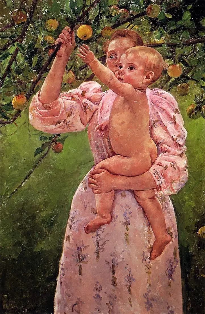 Baby reaching for an apple