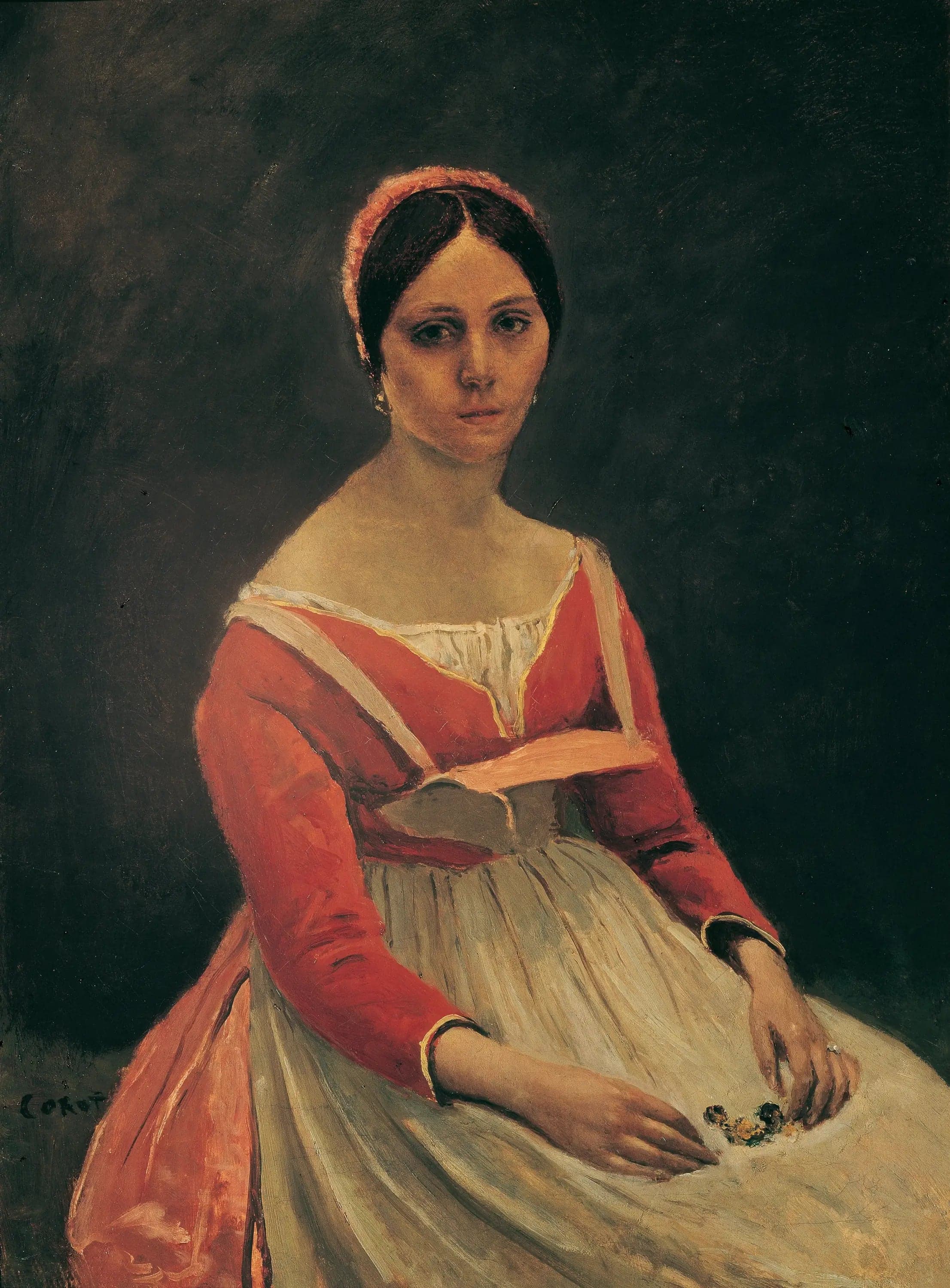 Young woman sitting, flowers in her hands - Jean