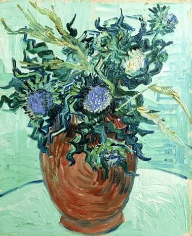 Vase with flowers and thistles