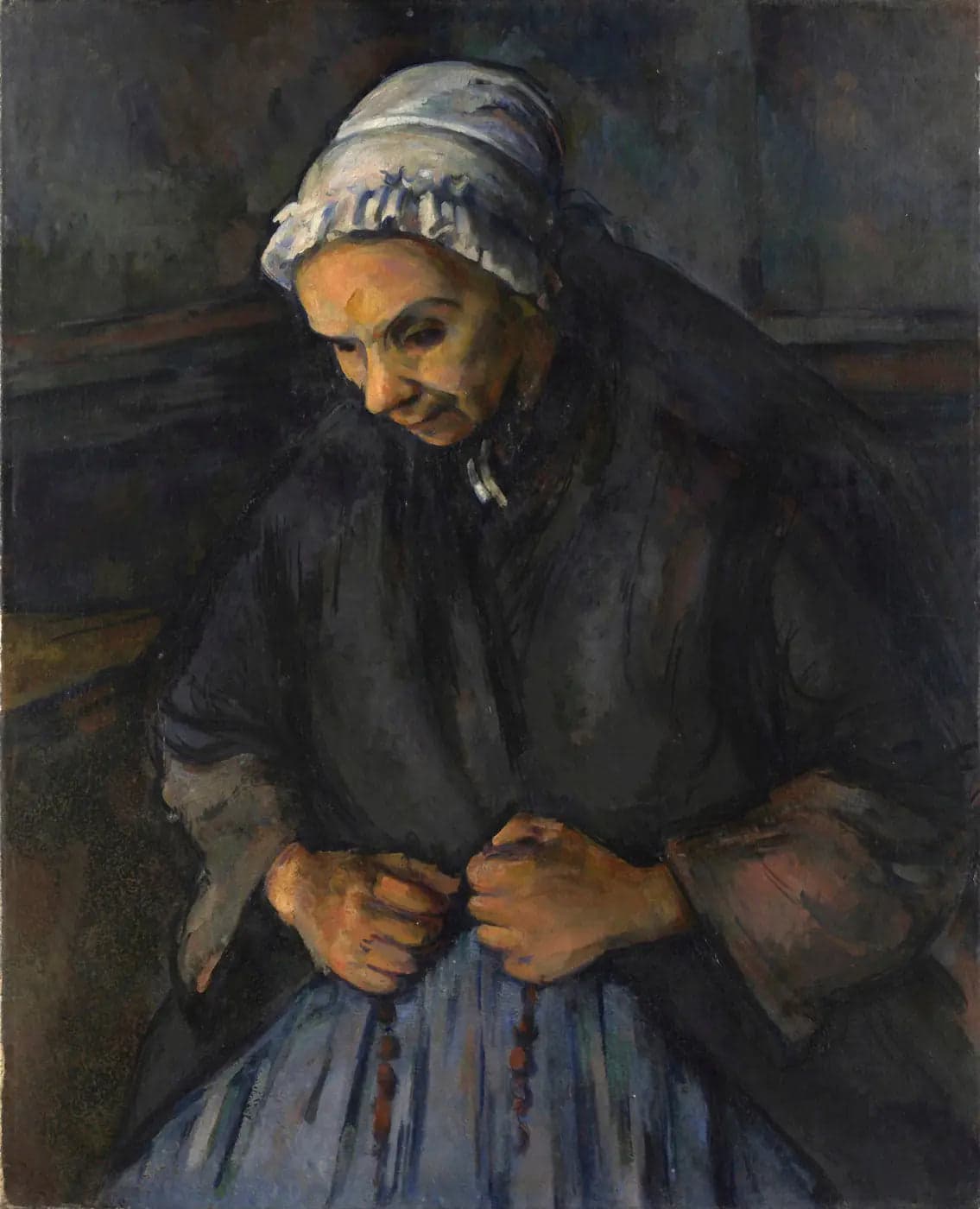 An old Woman with a rosary