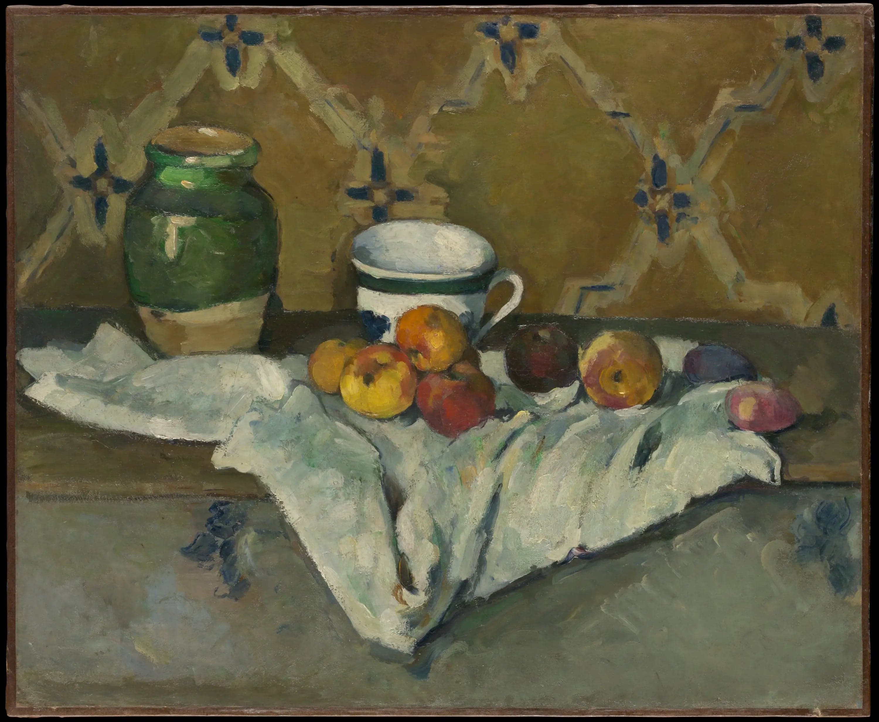 Pottery, cup and fruits on a white tablecloth