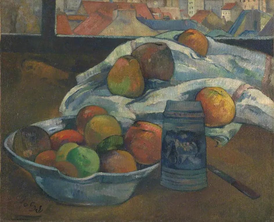 Fruit bowl and pitcher in front of the window