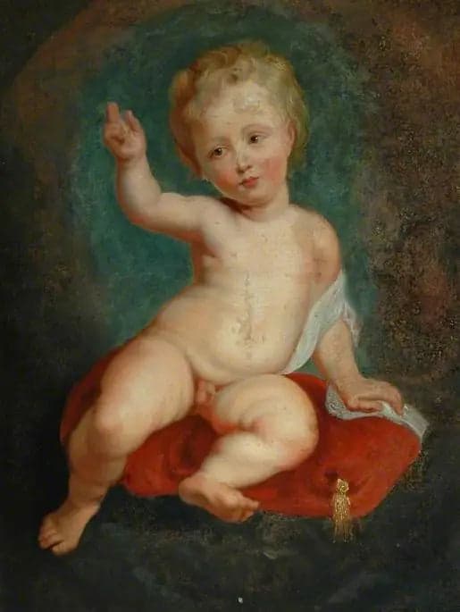 Child Sitting on a Red Cushion
