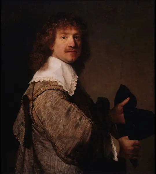 Portrait of a man holding a hat