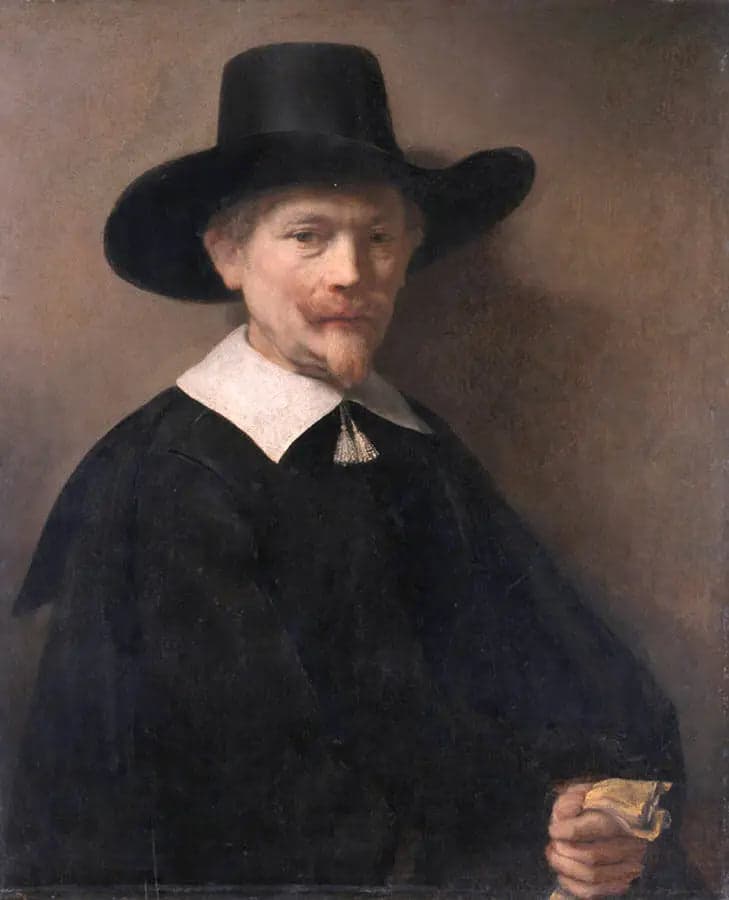 Portrait of a man with gloves in hand