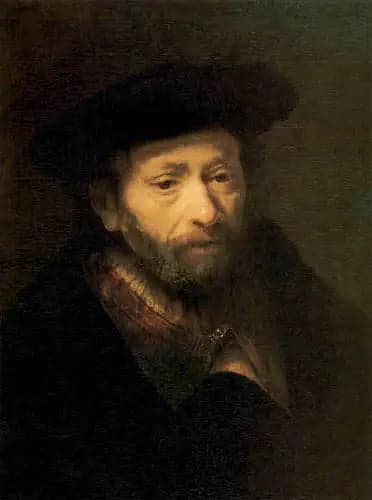 Portrait of an old bearded man with a hand in his coat