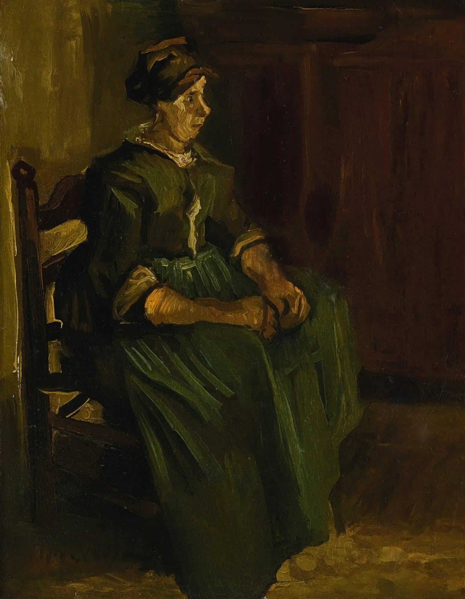 Peasant woman sitting on a chair