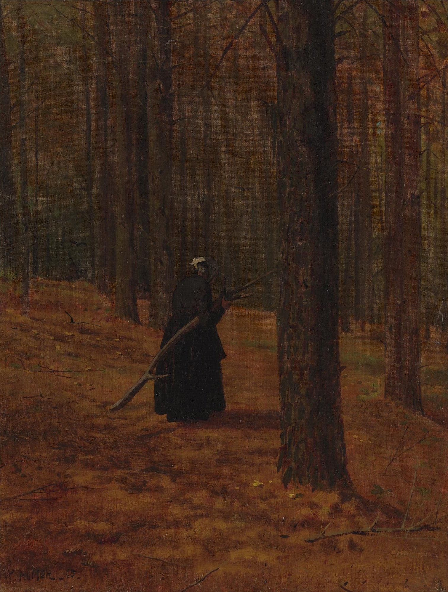 Vieille femme ramassant des fagots